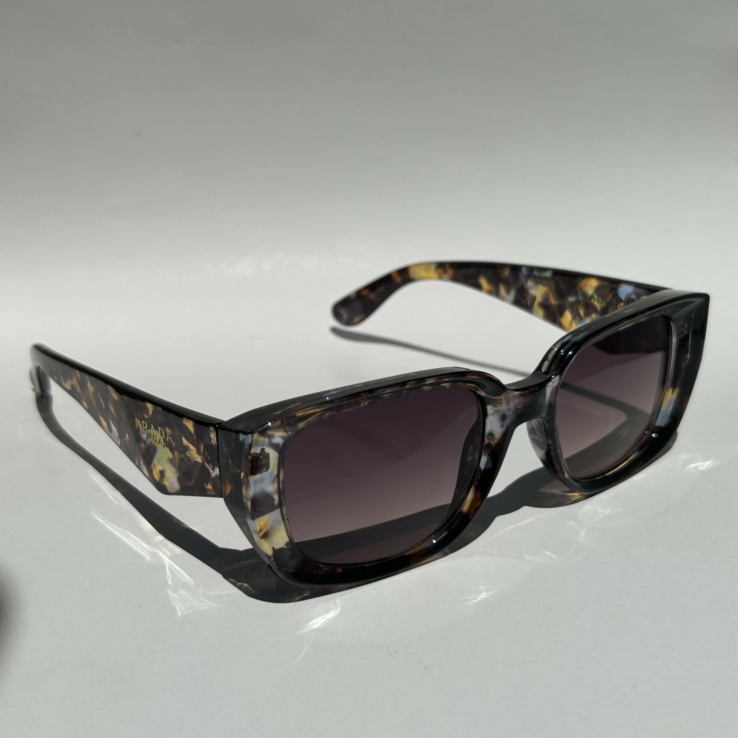 Prada Eyewear Lunettes De Soleil Symbole à Monture Carrée