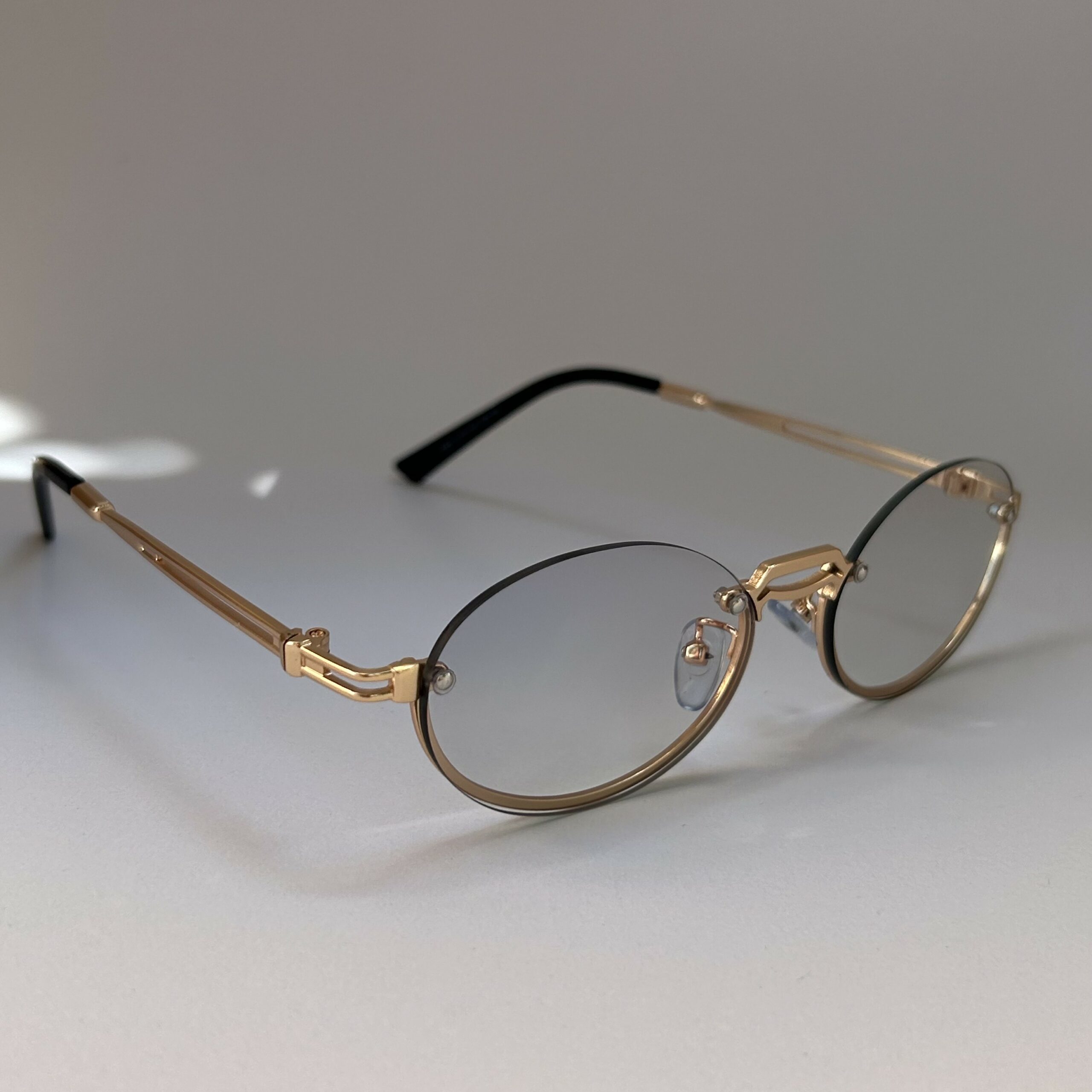 Lunettes ovales - Objectif transparent à cadre rétro doré
